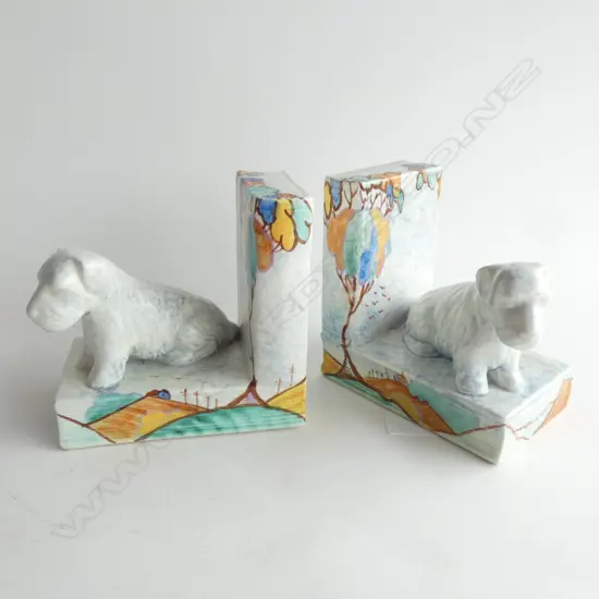 A pair of Beswick bookends with Scottie dogs in pale mottle blue glaze